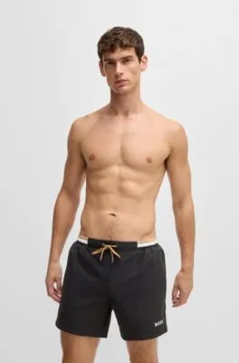 Bañador de tejido antidesgarros con logo en contraste