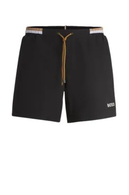 Bañador de tejido antidesgarros con logo en contraste