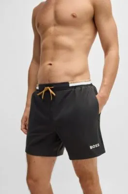 Bañador de tejido antidesgarros con logo en contraste