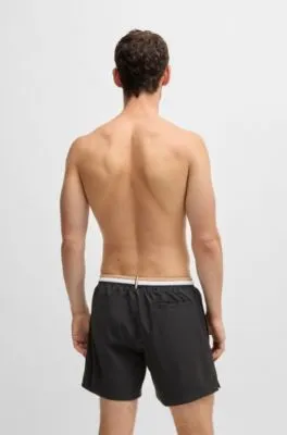Bañador de tejido antidesgarros con logo en contraste