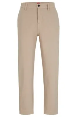 Chinos tapered fit en tejido de gabardina de algodón