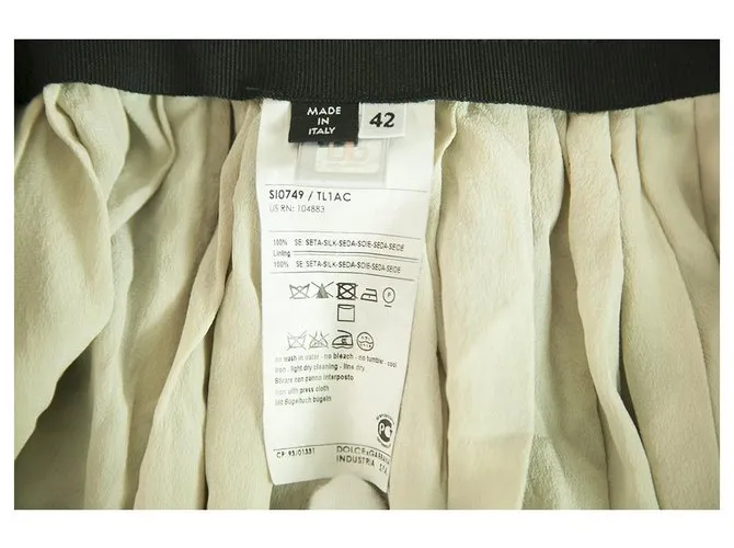 Dolce & Gabbana D&G Minifalda plisada de seda blanca y negra Talla 42 Negro 