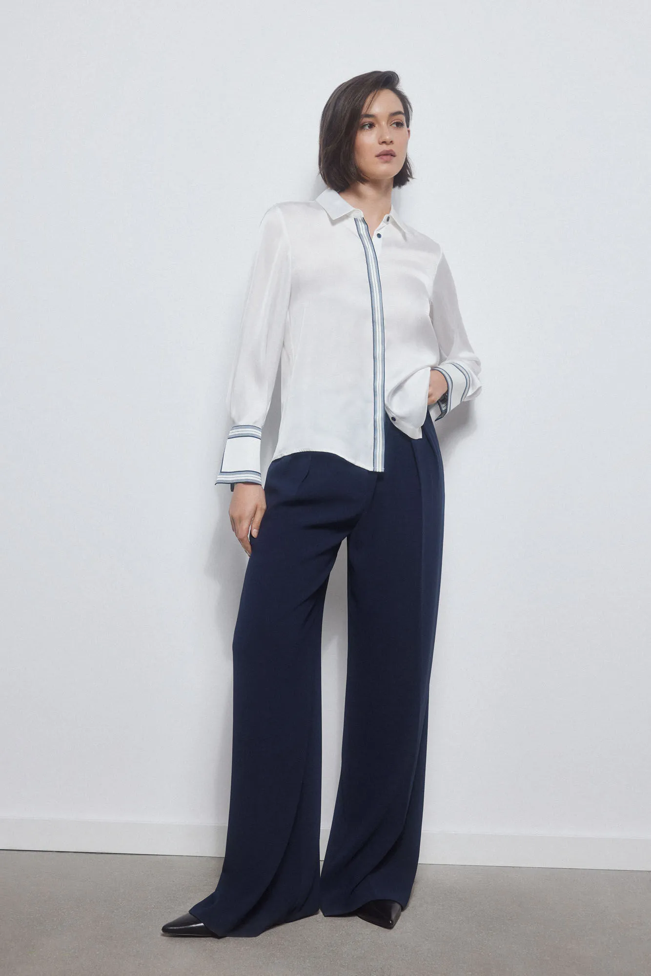 Fluid satin finish shirt.