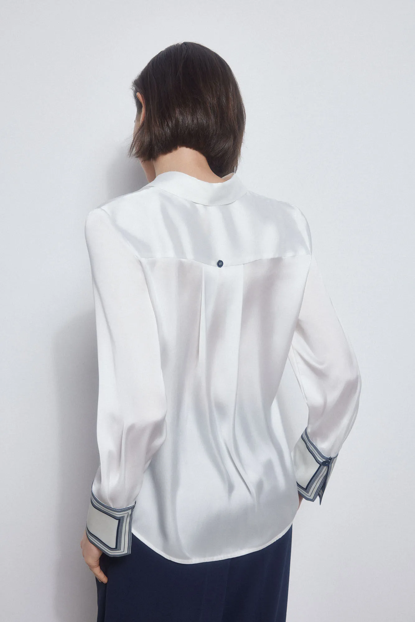 Fluid satin finish shirt.