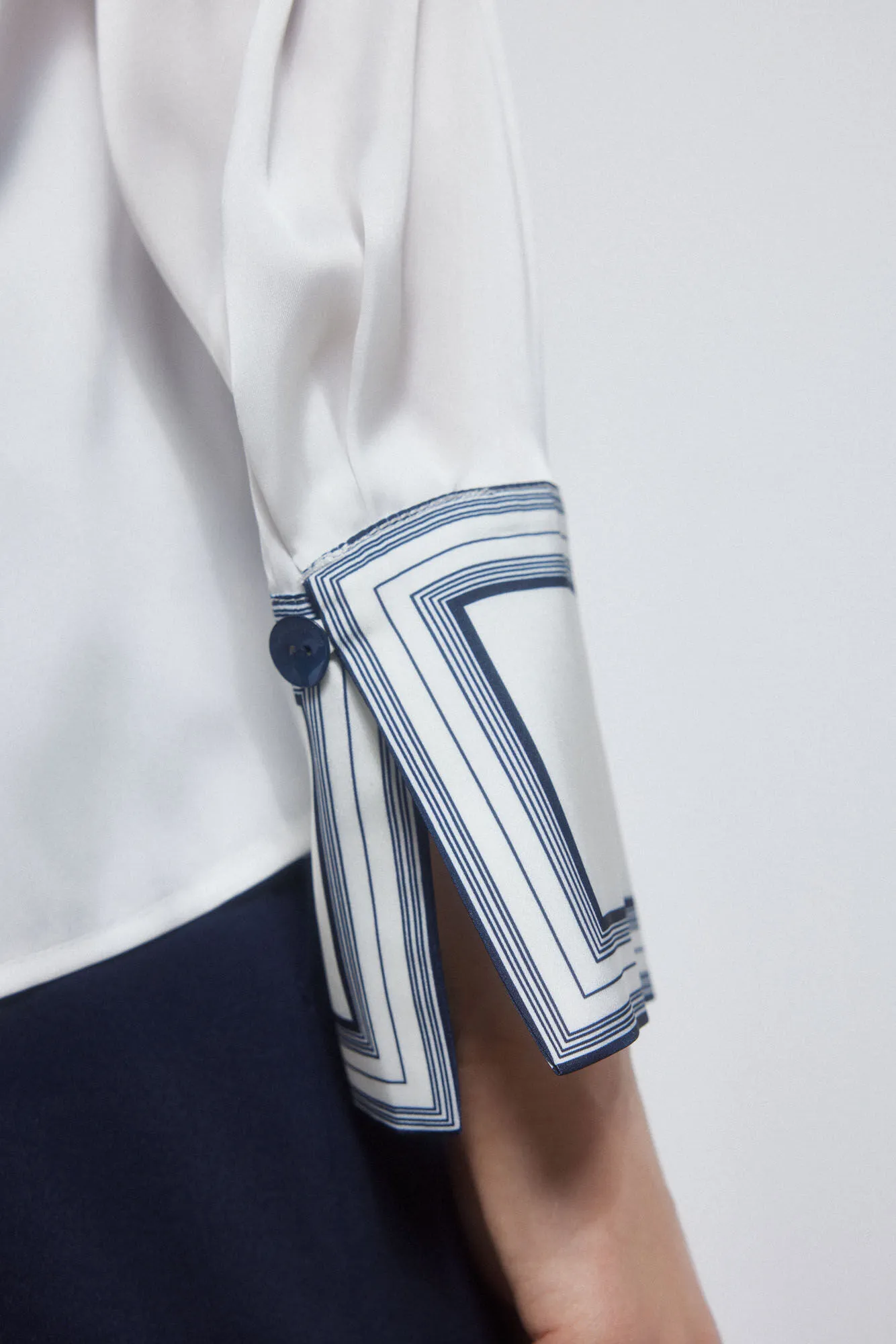 Fluid satin finish shirt.