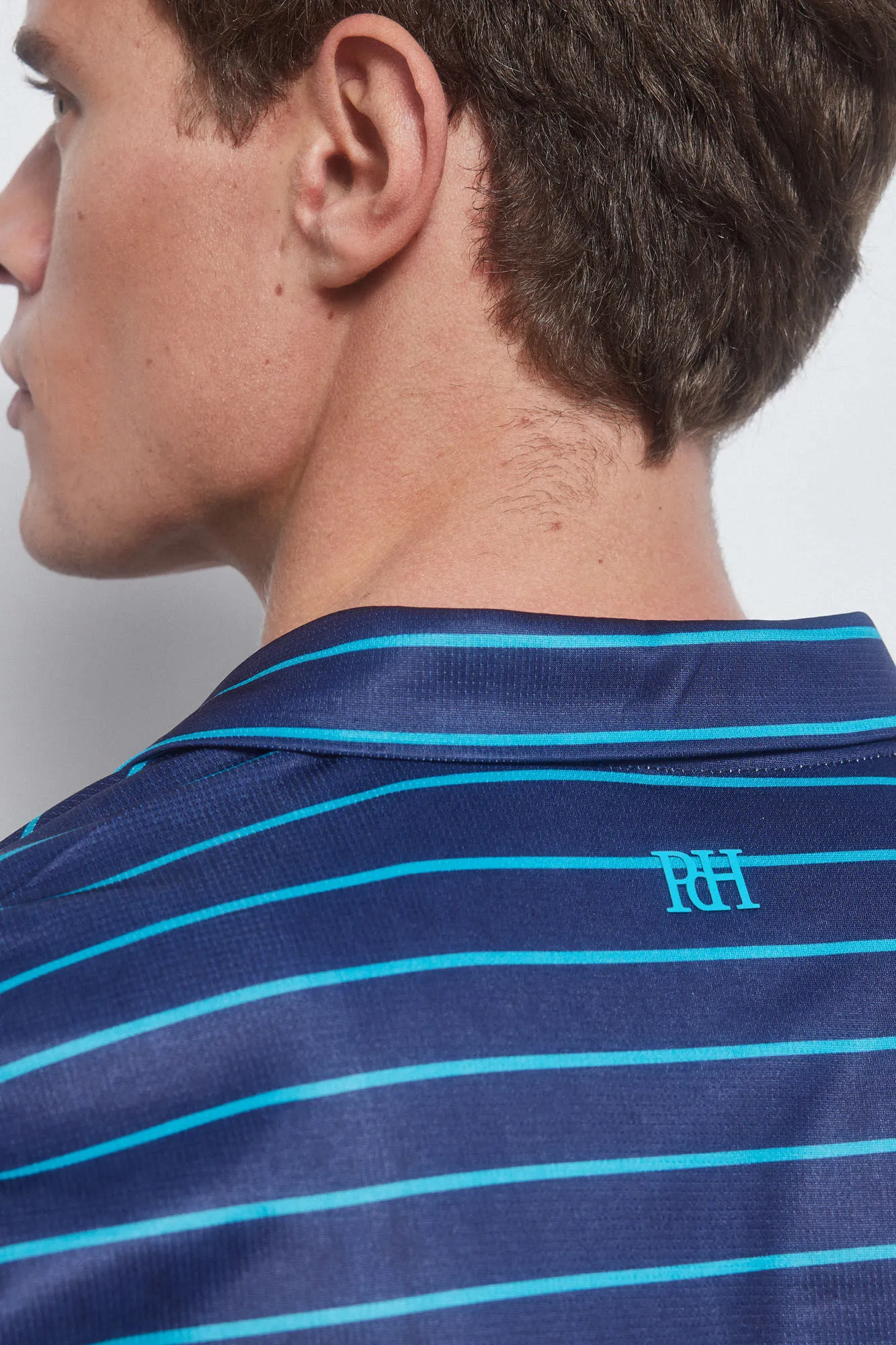 GOLF striped technical polo shirt