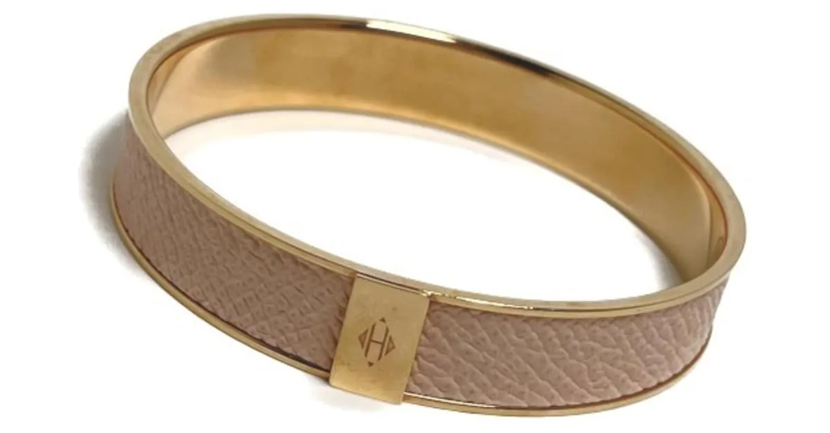 HERMèS  DORADO 