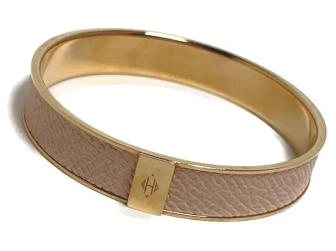 HERMèS  DORADO 