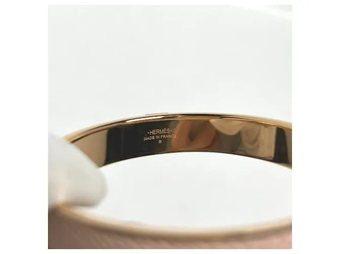 HERMèS  DORADO 