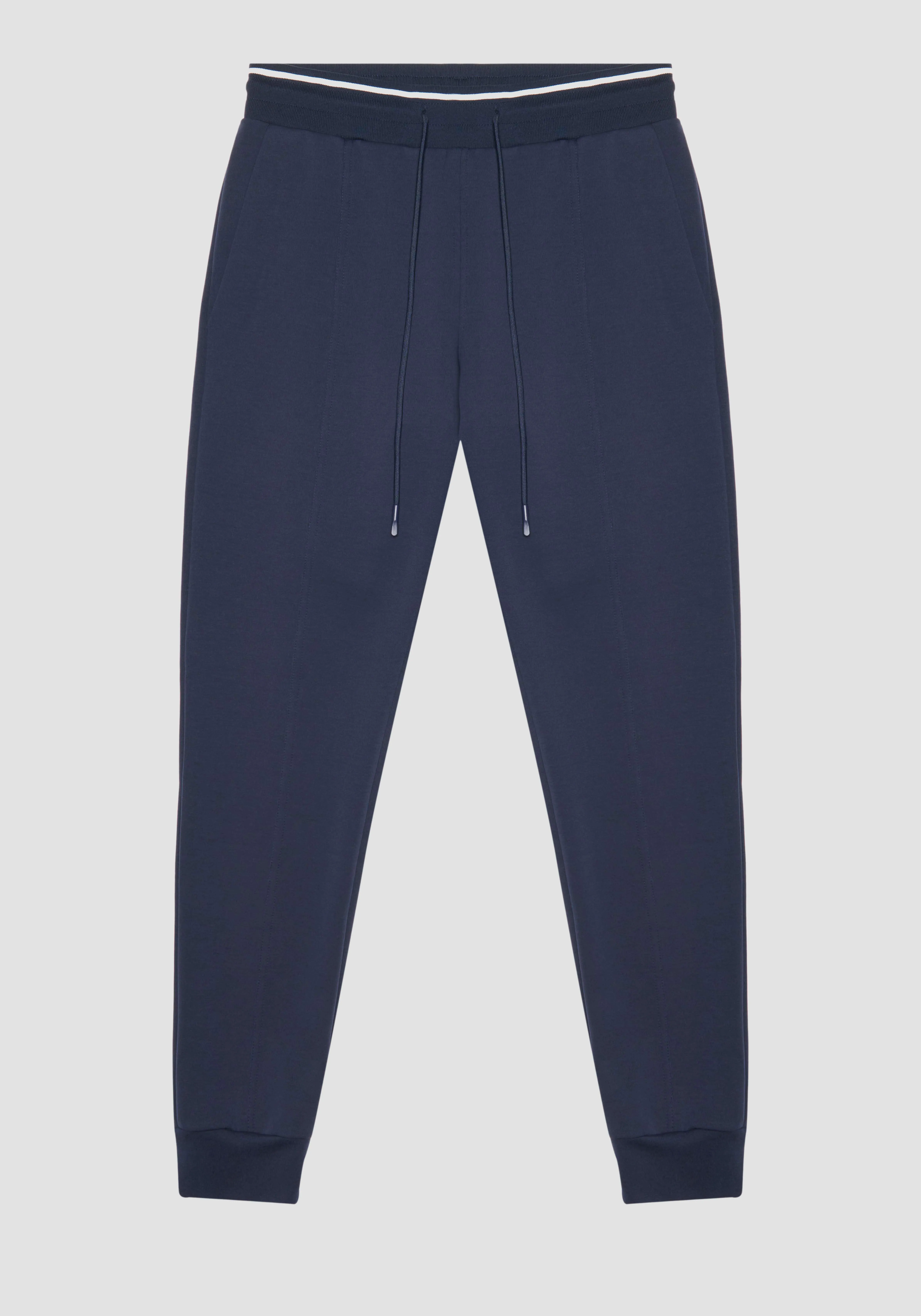 PANTALONES DE FELPA SLIM FIT DE MEZCLA DE ALGODÓN CON PARCHE CON LOGOTIPO EN LA PARTE POSTERIOR