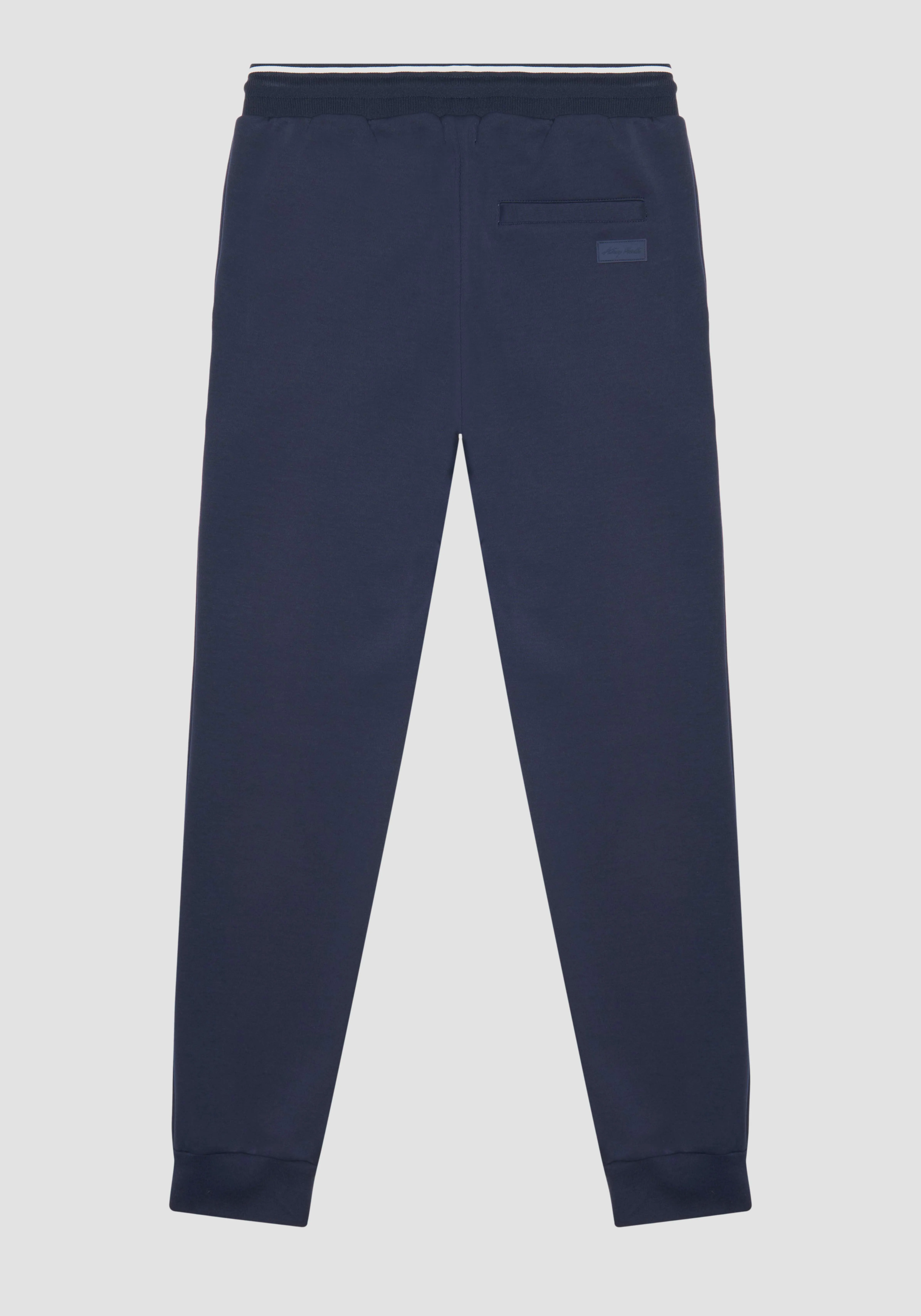 PANTALONES DE FELPA SLIM FIT DE MEZCLA DE ALGODÓN CON PARCHE CON LOGOTIPO EN LA PARTE POSTERIOR