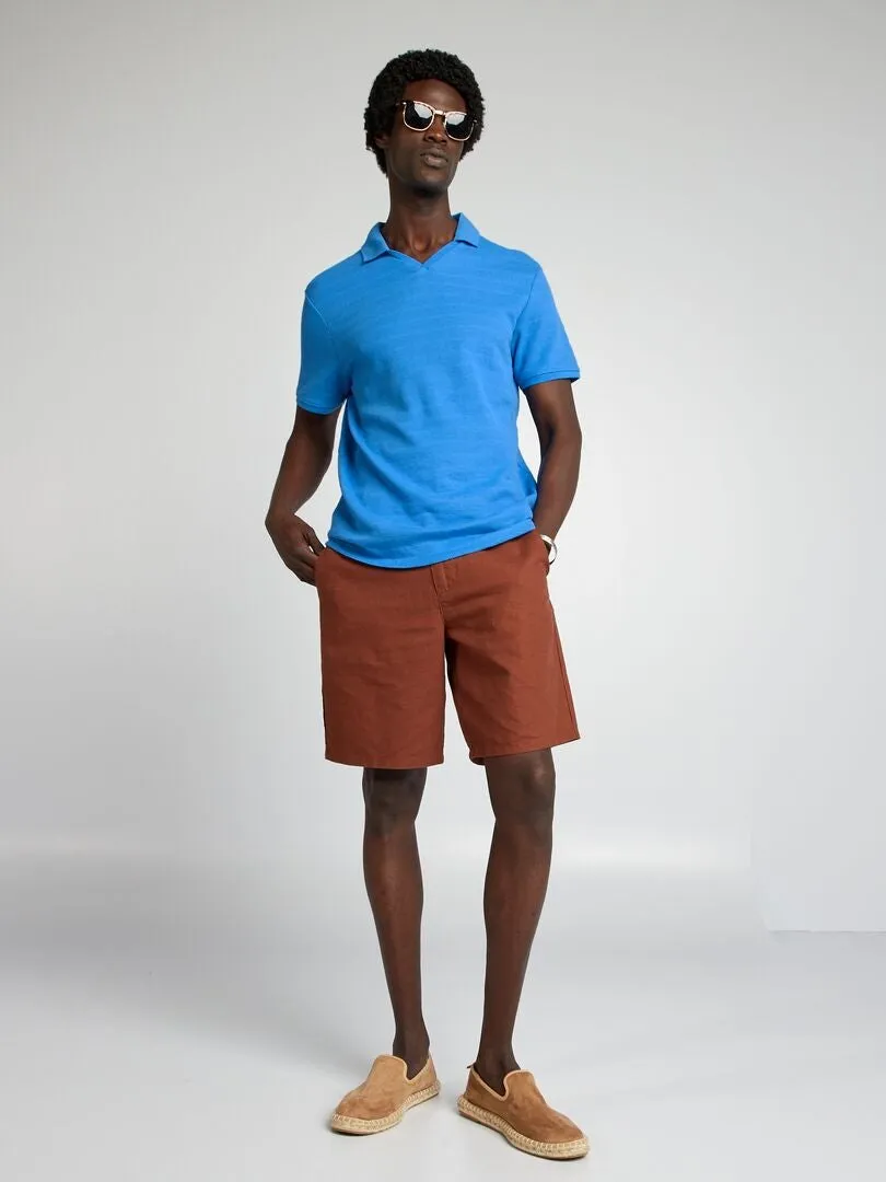 POLO DE PUNTO CON TEXTURA CON CUELLO DE PICO  AZUL