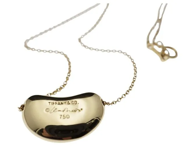 Tiffany & Co TIFFANY Y COMPAÑIA. Colgante Elsa Peretti Bean Design 18K Oro Dorado Gold hardware 