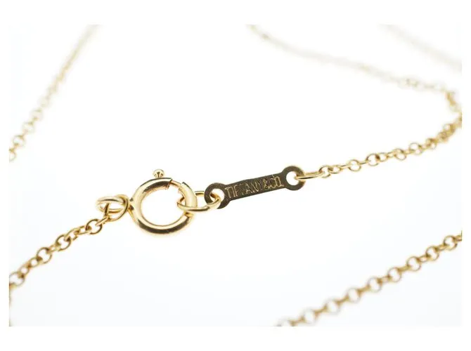 Tiffany & Co TIFFANY Y COMPAÑIA. Colgante Elsa Peretti Bean Design 18K Oro Dorado Gold hardware 