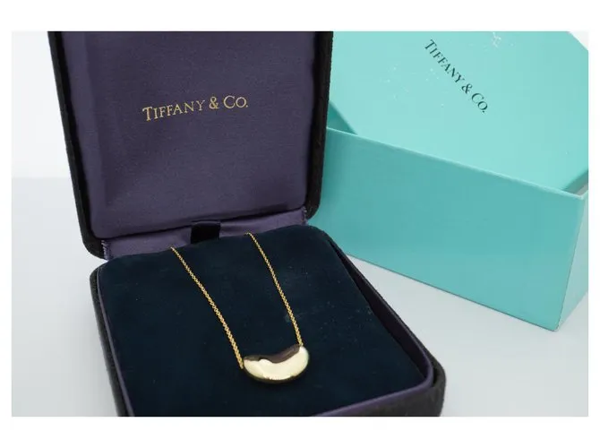 Tiffany & Co TIFFANY Y COMPAÑIA. Colgante Elsa Peretti Bean Design 18K Oro Dorado Gold hardware 