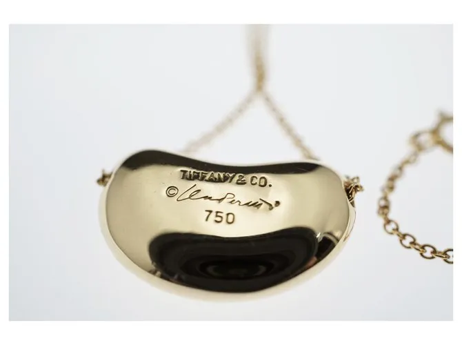 Tiffany & Co TIFFANY Y COMPAÑIA. Colgante Elsa Peretti Bean Design 18K Oro Dorado Gold hardware 