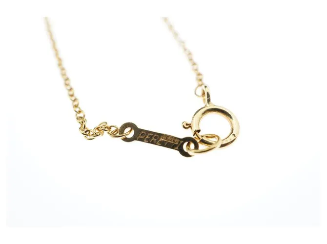 Tiffany & Co TIFFANY Y COMPAÑIA. Colgante Elsa Peretti Bean Design 18K Oro Dorado Gold hardware 