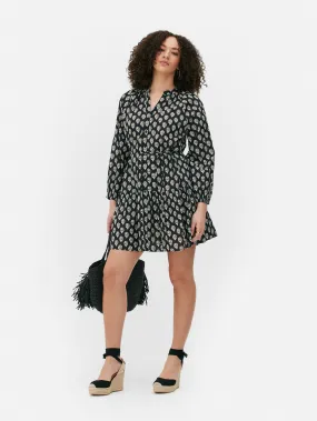 Vestido corto con vuelo estampado